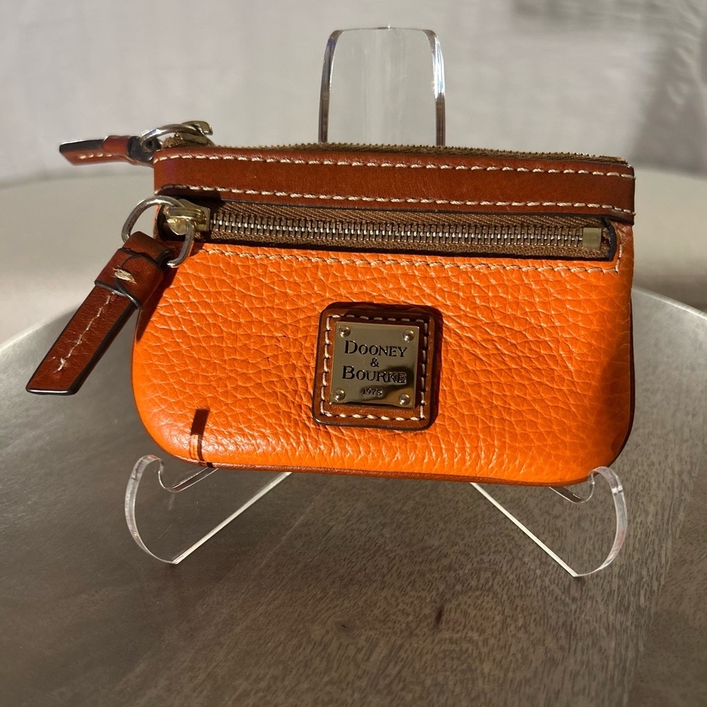 Dooney and Bourke Pebble Leather Small Coin Case in ORANGE
